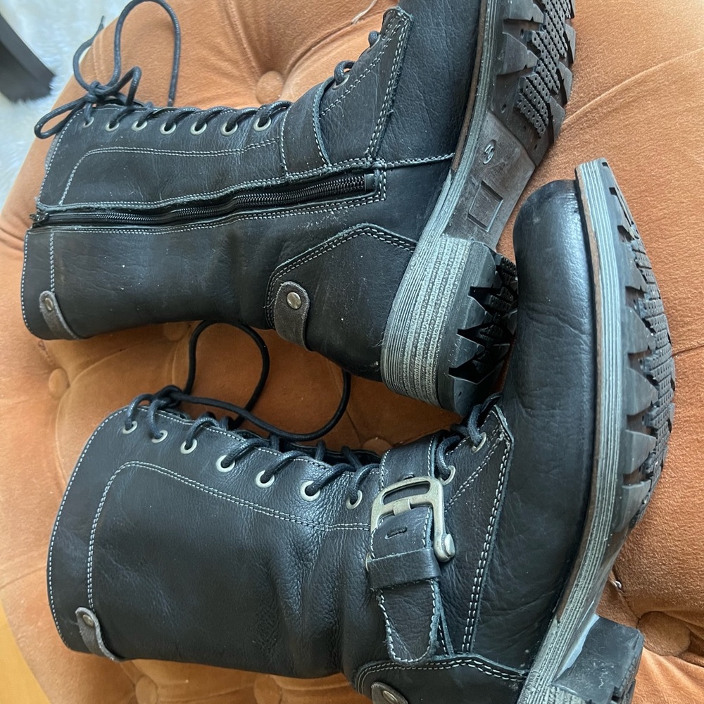 Black leather lace up boots with grey suede tongue and accents.Bos & Co.